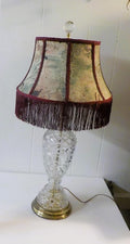 A Classic cut glass table - parlor lamp with a brass base and fabric shade. 28 " tall lot 2261