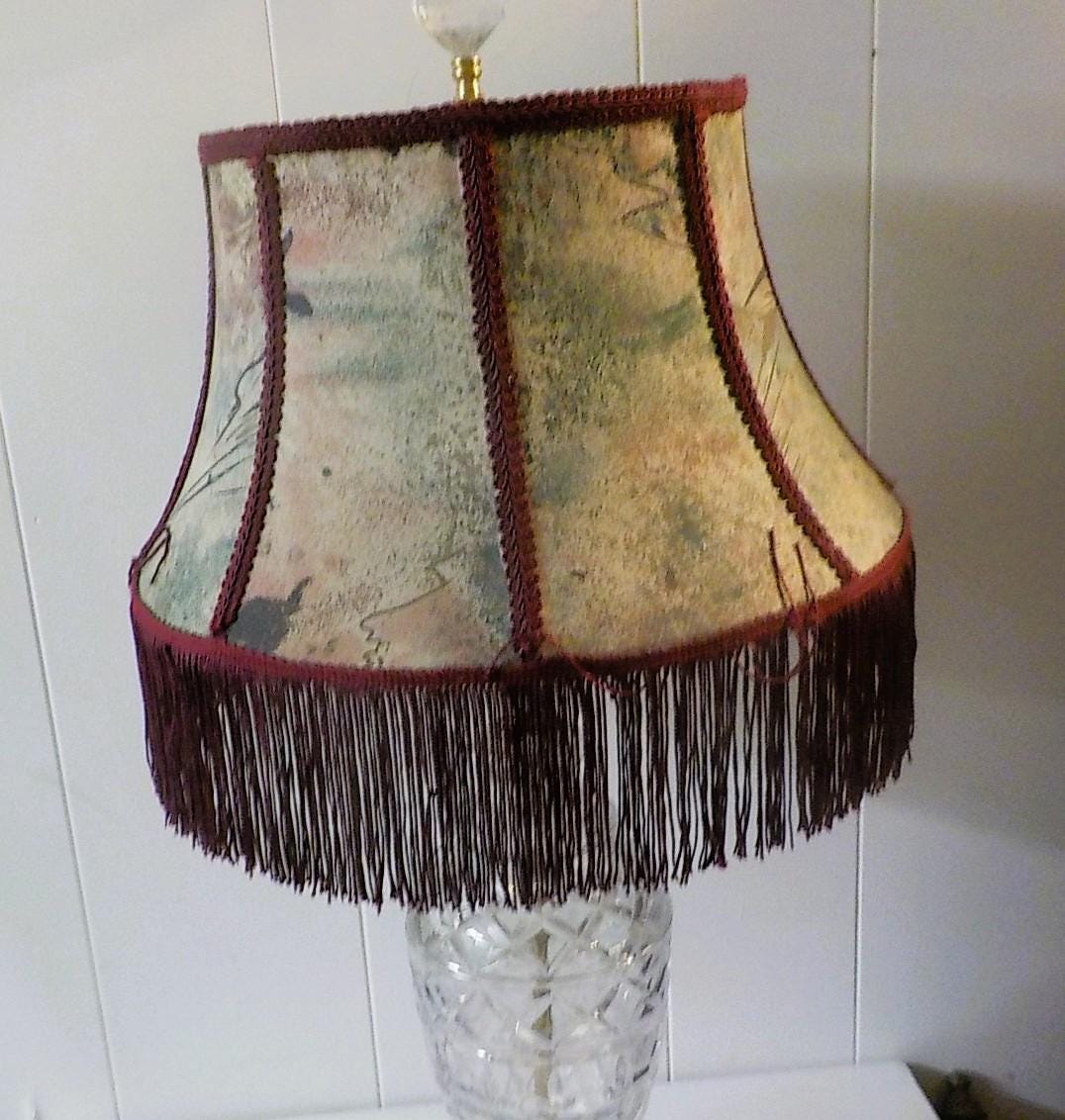 A Classic cut glass table - parlor lamp with a brass base and fabric shade. 28 " tall lot 2261
