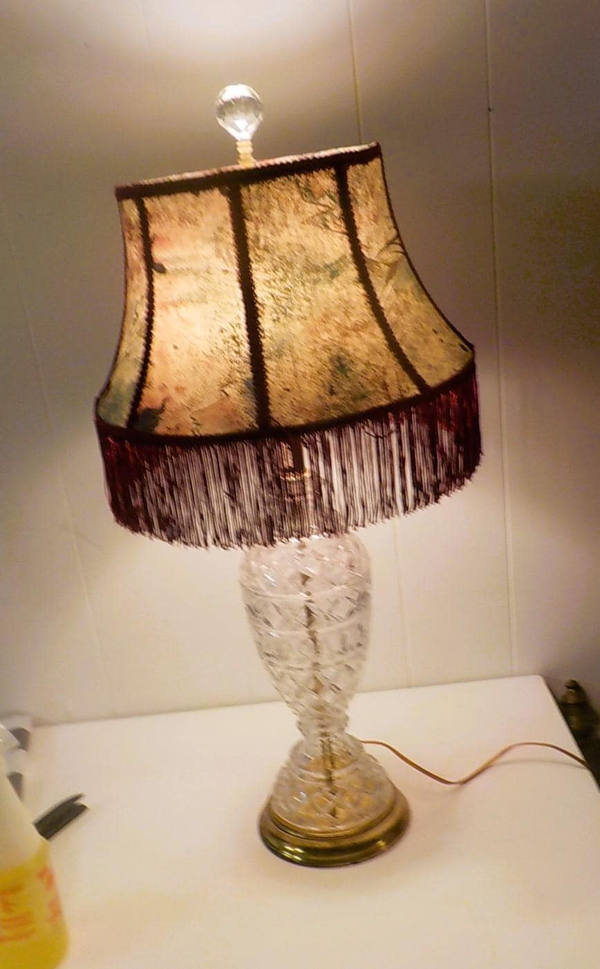 A Classic cut glass table - parlor lamp with a brass base and fabric shade. 28 " tall lot 2261